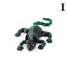 A realistic 3D printed figurine of a green Sphynx cat with glowing yellow eyes.