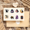 A pack of cartoon black star cat PVC stickers for DIY crafts and scrapbooking displayed on a light background.