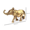 A small antique bronze elephant figurine used as a tea pet or table ornament.