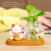 Mini resin desk ornament featuring a green ivy plant and a white lucky cat in a glass vase