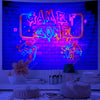 A vibrant neon sign featuring a game zone graphic on a brick wall background.