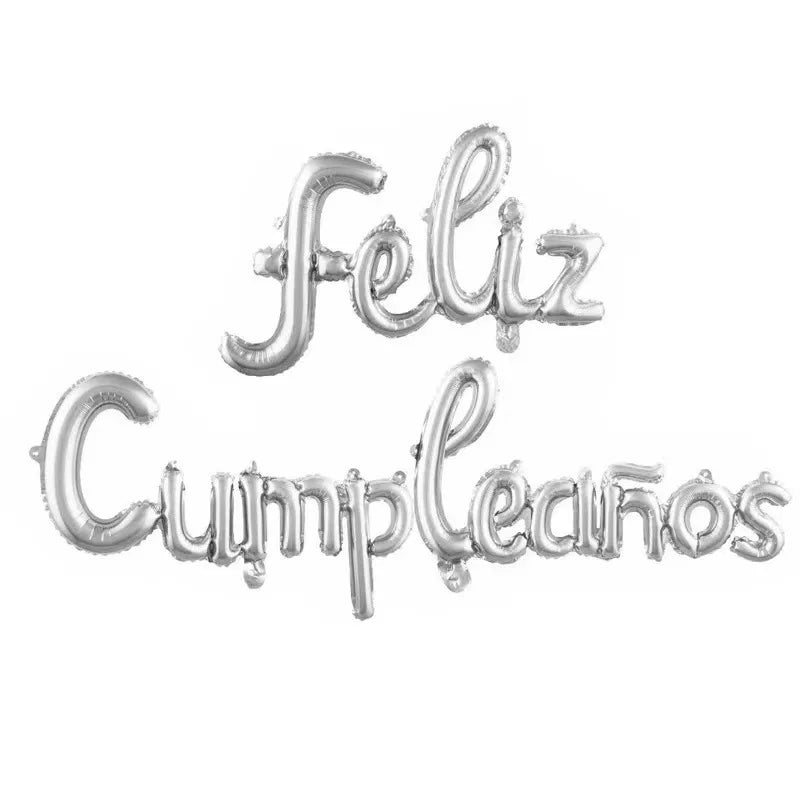 Silver foil letters spelling Feliz Cumpleaños