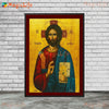 A painting of Jesus Christ in a dark robe against a golden background, framed in red.