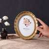Vintage Resin Photo Frame with Golden Ornamental Details