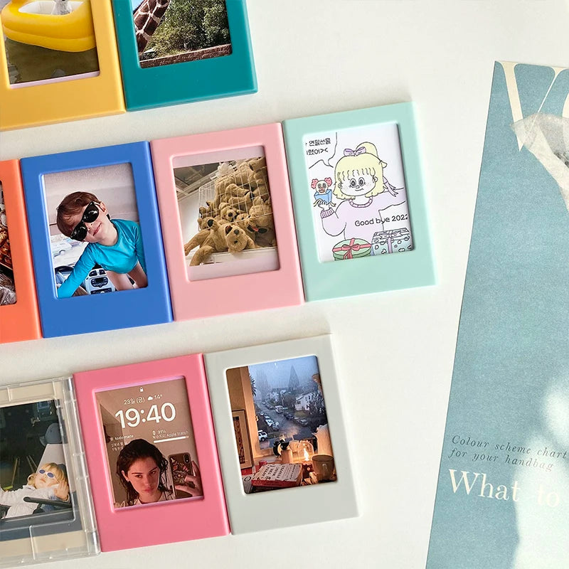A collection of colorful magnetic photo frames displaying various memories and images.
