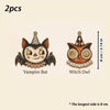 A set of two vintage wooden Halloween hanging ornaments featuring a Vampire Bat and a Witch Owl.