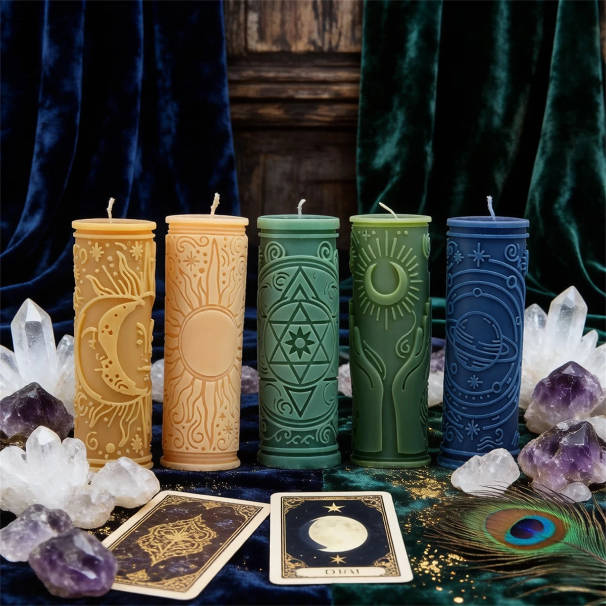 A collection of teal and yellow silicone candle molds displayed on a dark velvet cloth with crystals and gold accents.