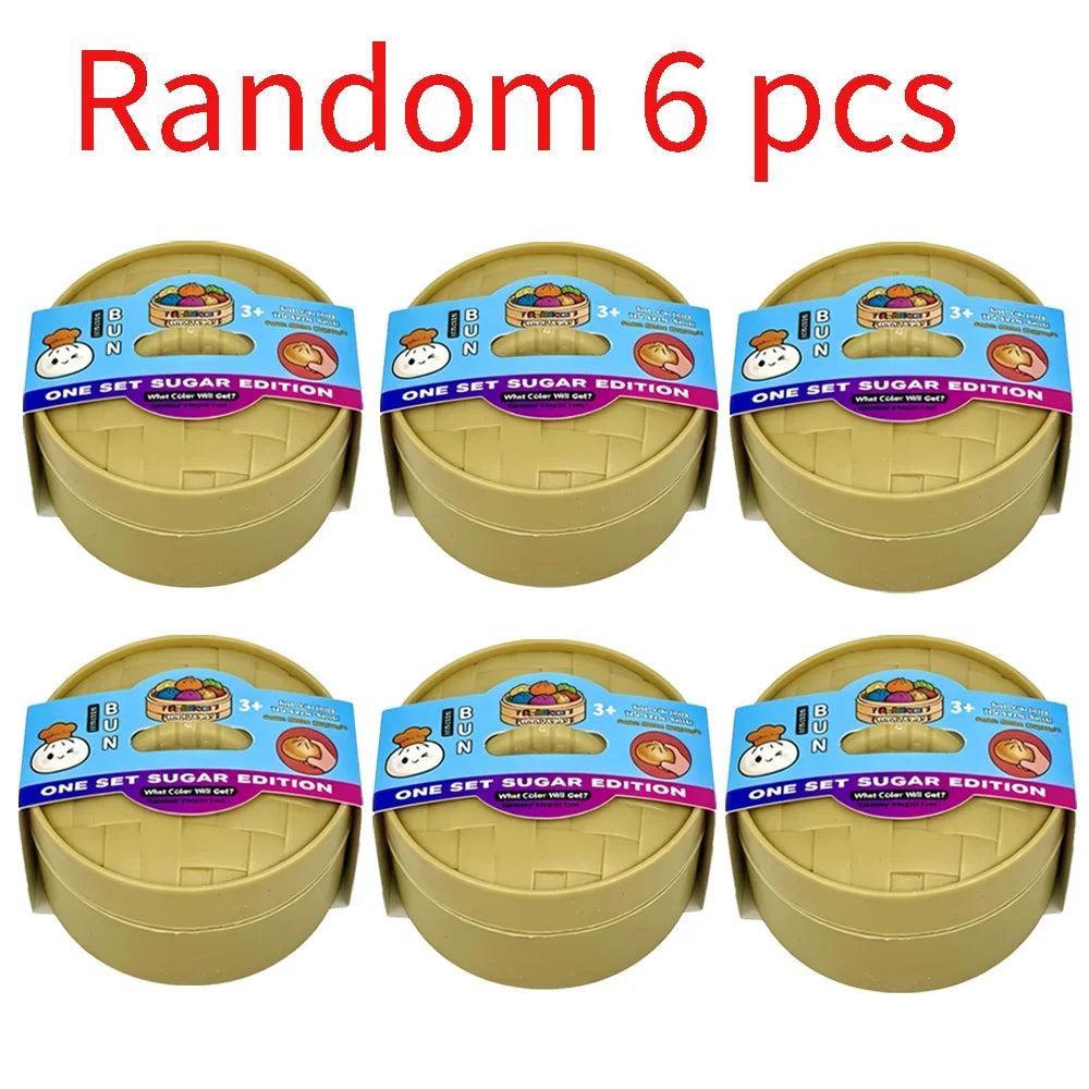 Six sets of squishy dumpling stress relief toys in yellow packaging