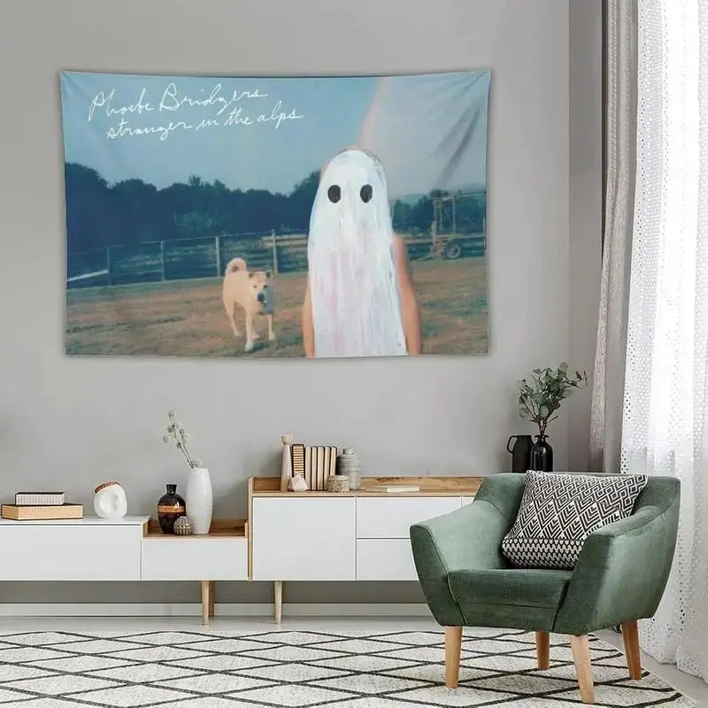 A wall tapestry featuring an indie album cover design of a ghost in the Alps landscape.