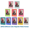 A collection of 20 different colored magnetic photo frames for displaying Instax mini film.