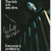 Poster for Halloween featuring a menacing figure and text that says The trick is to stay alive.