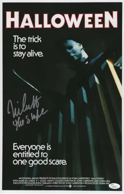 Poster for Halloween featuring a menacing figure and text that says The trick is to stay alive.
