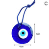 Blue glass evil eye amulet pendant with a string for decoration
