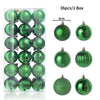 A set of 36 green and iridescent Christmas tree ornament balls packaged in a box.
