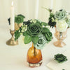 A bouquet of forest green and white foam roses with stems displayed on a wooden vase.