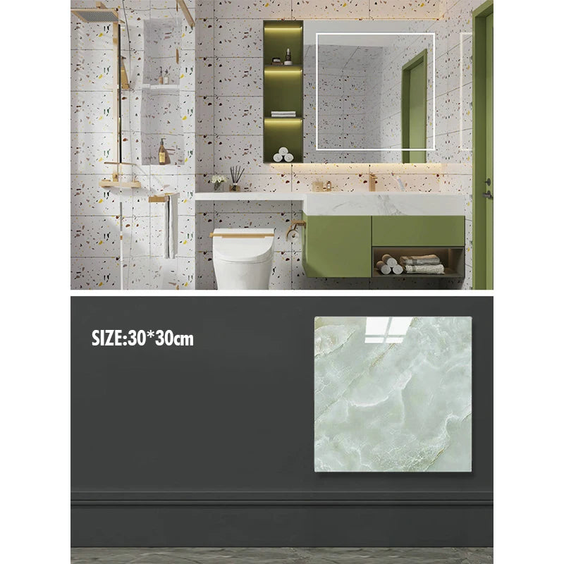 A modern kitchen or bathroom wall featuring marble-patterned decals and green cabinetry.