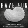 White heart-shaped wings sculpture made of gypsum for aromatherapy jewelry