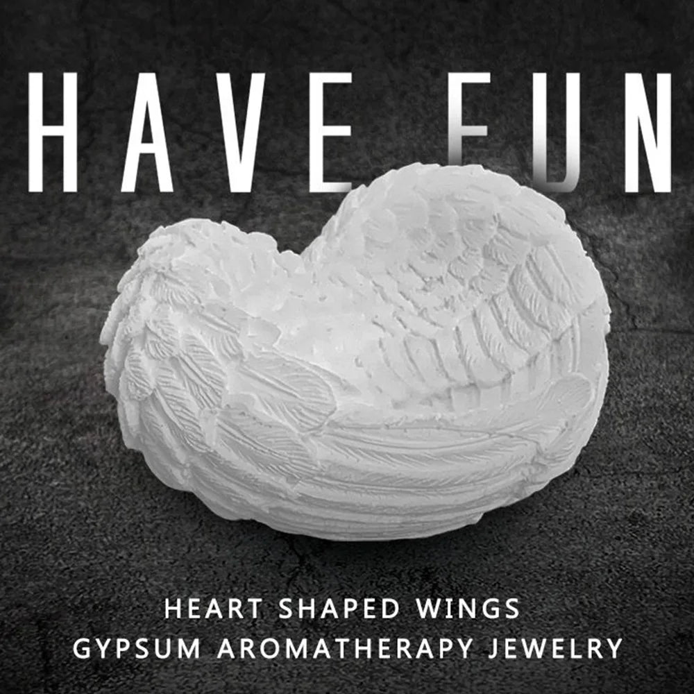 White heart-shaped wings sculpture made of gypsum for aromatherapy jewelry