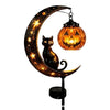 Halloween stake light featuring a black cat silhouette and pumpkin face on a crescent moon design