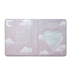 A clear pink photocard album with a winter bear design and a heart-shaped window.