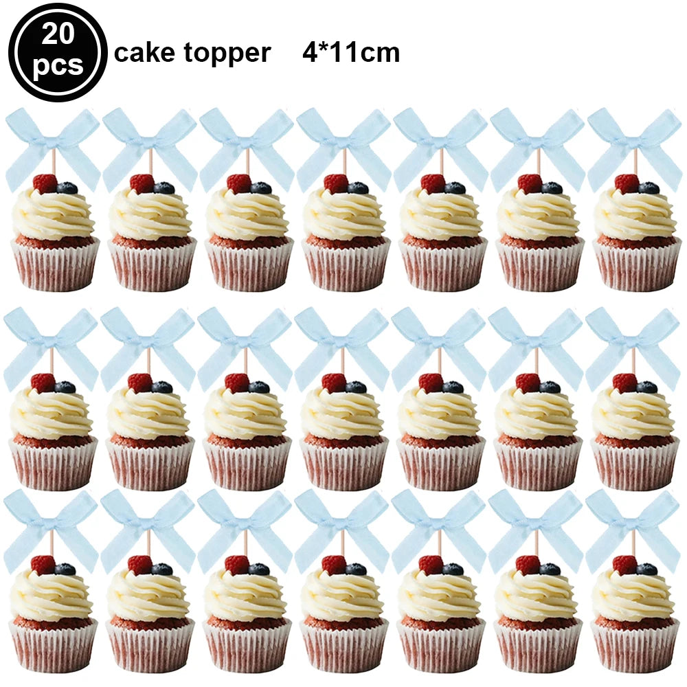 A set of 20 pink bow cupcake toppers measuring 4x11cm.