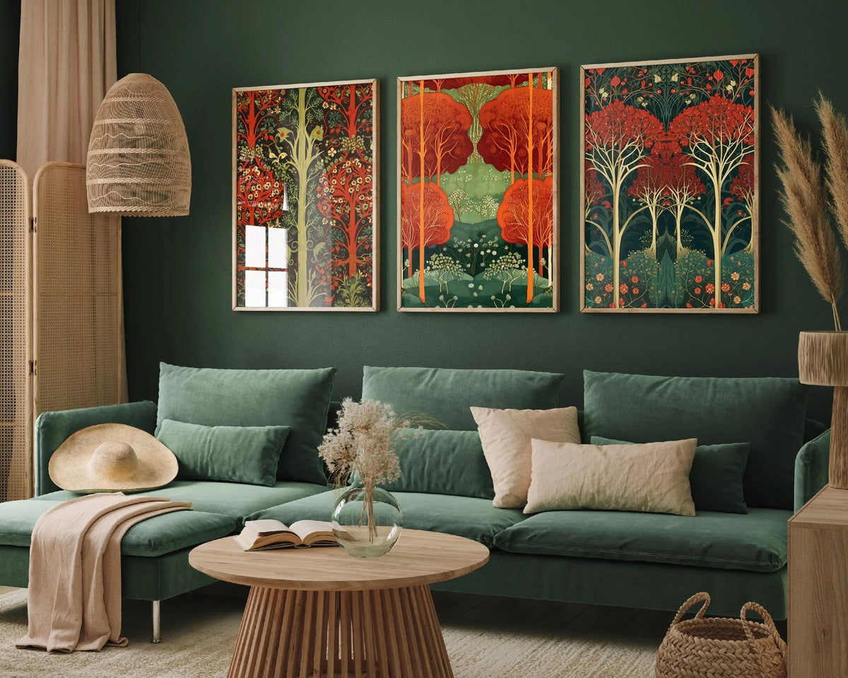 Three canvas prints featuring vibrant red and green wildflower landscapes displayed on a dark green wall above a sofa.