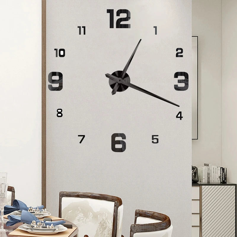 A large, modern wall clock with a white background and black numbers and hands is displayed in an indoor setting.