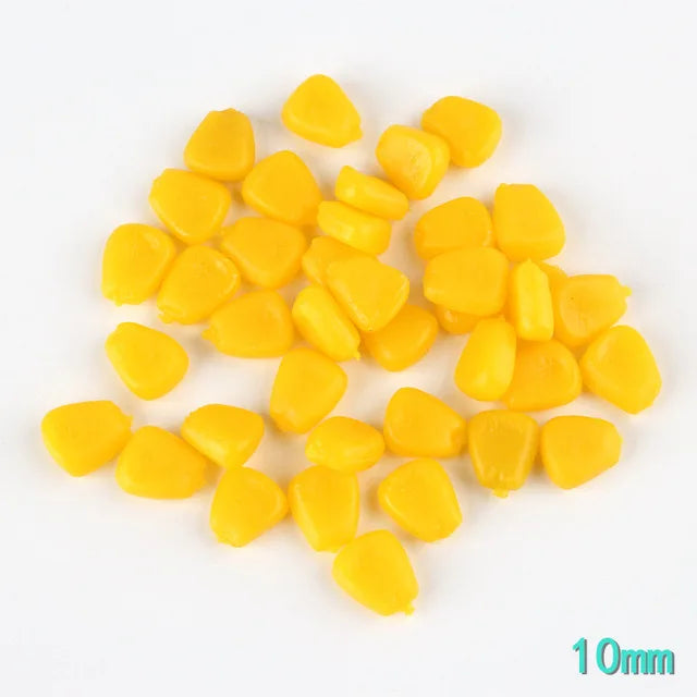 A cluster of small, yellow resin fake corn miniatures for crafting and décor.
