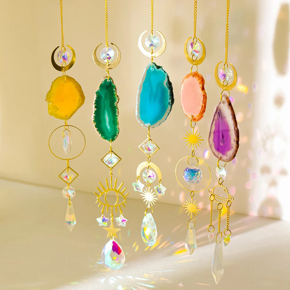 A set of hanging crystal decor featuring various colored agate stones and sun motifs.