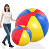 A woman stands next to a large inflatable pool party ball divided into red, yellow, and blue sections.