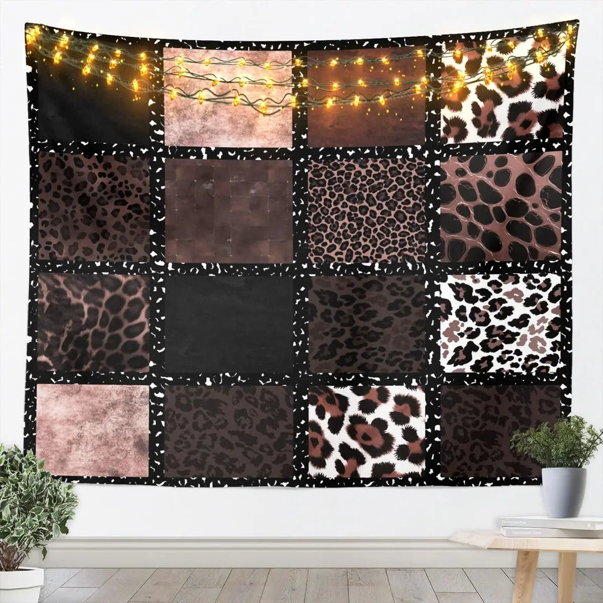 A tapestry wall hanging featuring various shades of leopard print and animal patterns.
