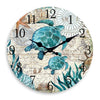A round wall clock face with a vintage map background and a large teal turtle design.
