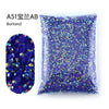 Bag of purple and gold glitter resin rhinestones for crafting