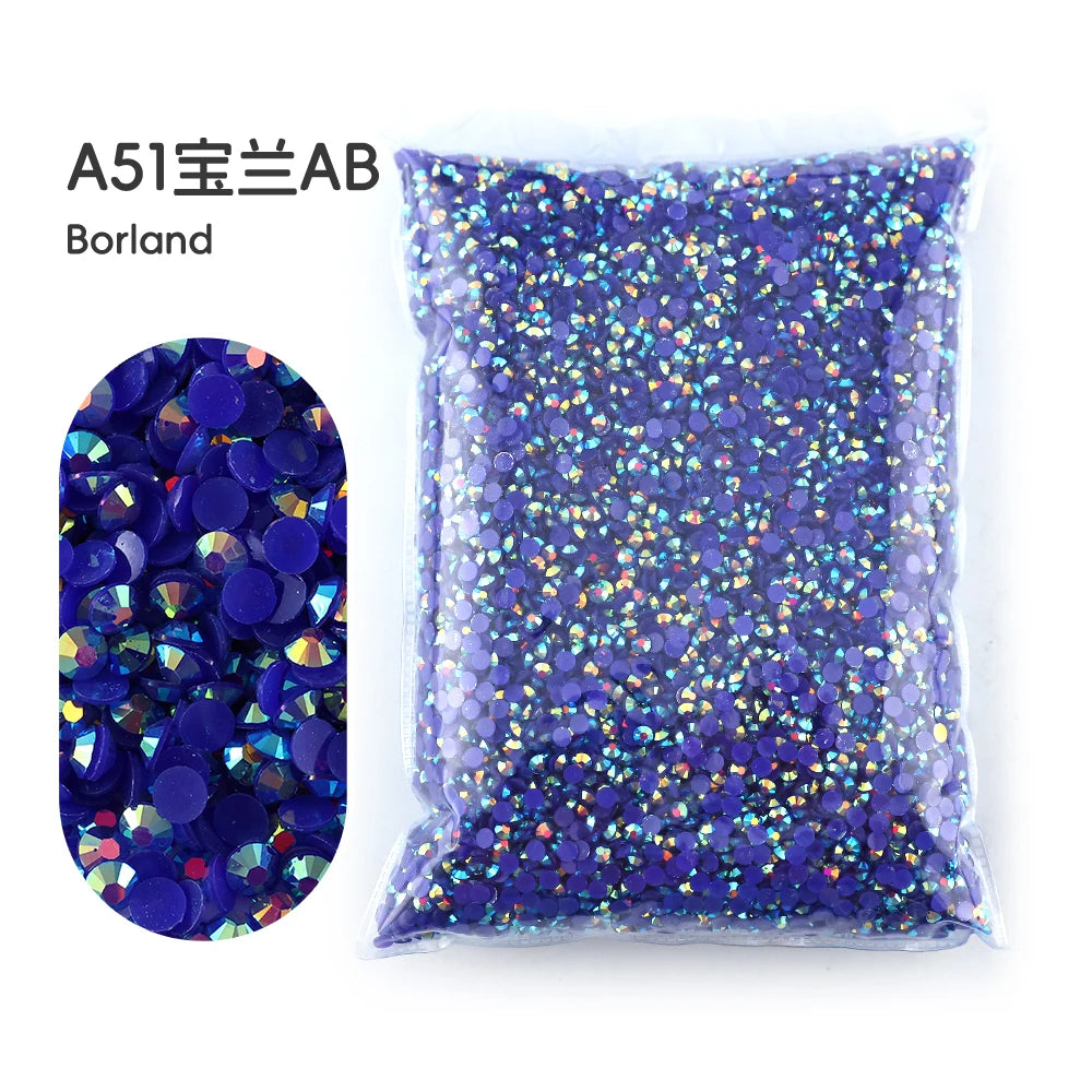 Bag of purple and gold glitter resin rhinestones for crafting