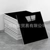 A stack of white faux marble 3D self-adhesive wall tiles is shown next to a black rectangular tile.