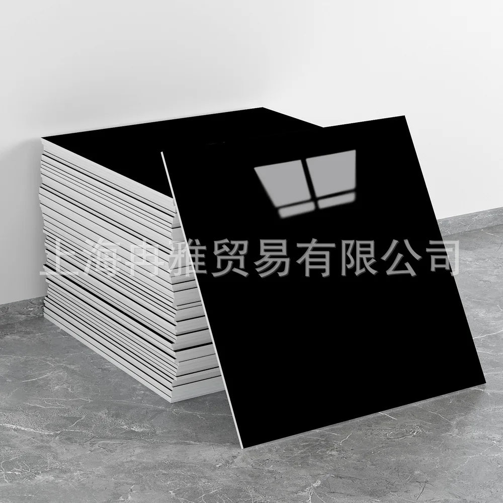 A stack of white faux marble 3D self-adhesive wall tiles is shown next to a black rectangular tile.
