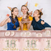 Four young women celebrating a birthday with party hats and candles