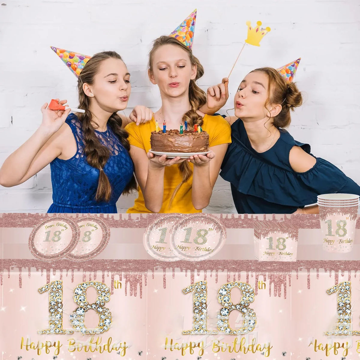 Four young women celebrating a birthday with party hats and candles
