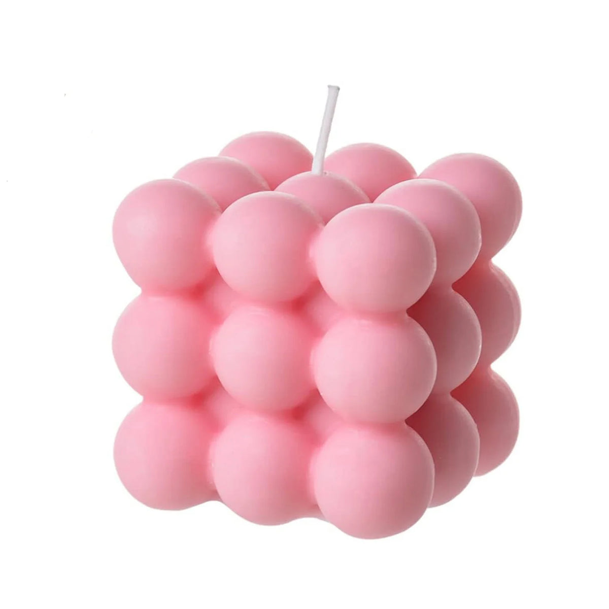A cluster of pink soy wax candles shaped like spheres and arranged in a cube pattern.