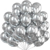 Un bouquet de ballons métalliques rose et or rose liés ensemble