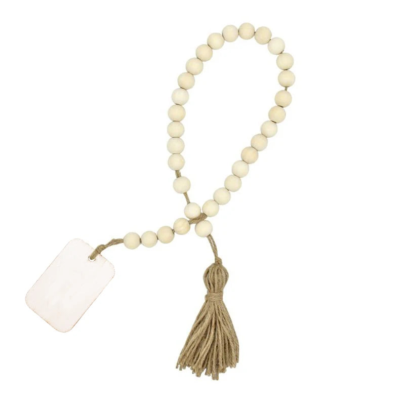 Handmade wood and jute bead garland with a white tag