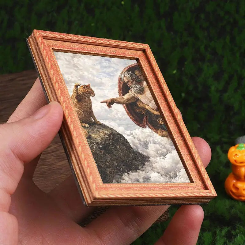 A wooden framed art print featuring a painting of a lion looking down from the sky.
