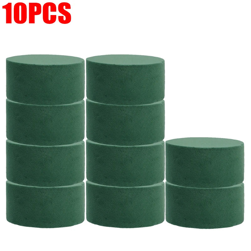 Ten round blocks of green floral foam for flower arrangements