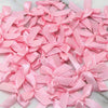 Pink satin ribbon bows for a princess birthday banner balloon set