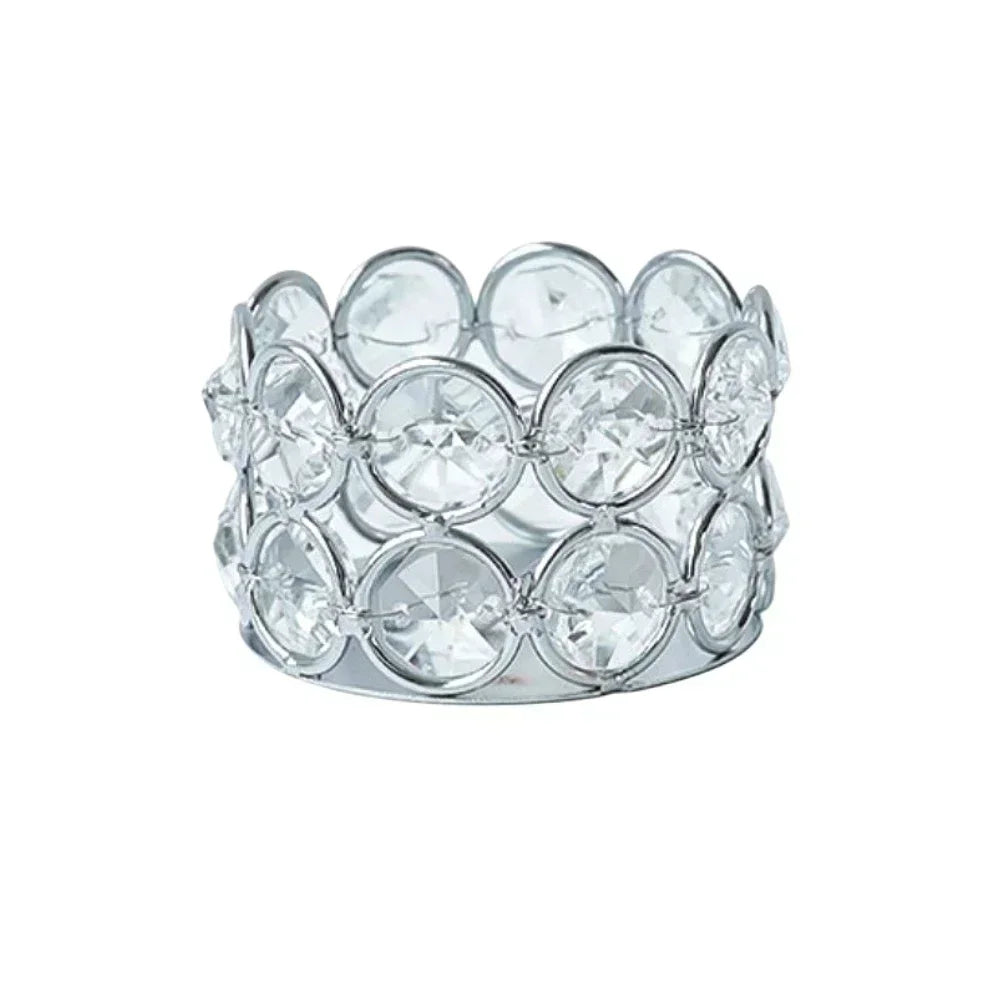 Silver crystal candle lantern holder with a floral pattern.