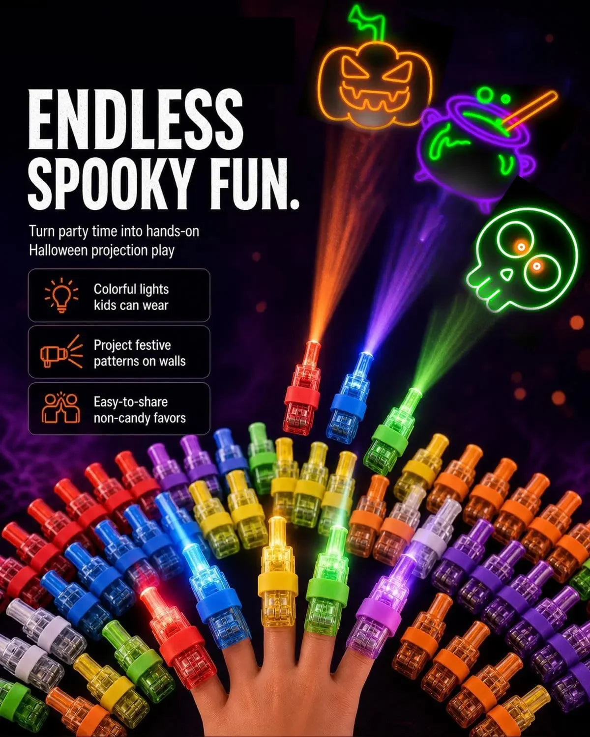 A hand holds an assortment of Halloween LED finger projector lights casting spooky patterns on a dark background.
