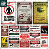 A collection of vintage warning metal signs featuring various dangers like biohazard, danger, and warnings for decor.