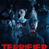 A dark, intense movie poster featuring a bloody, grotesque figure and several shadowy characters.
