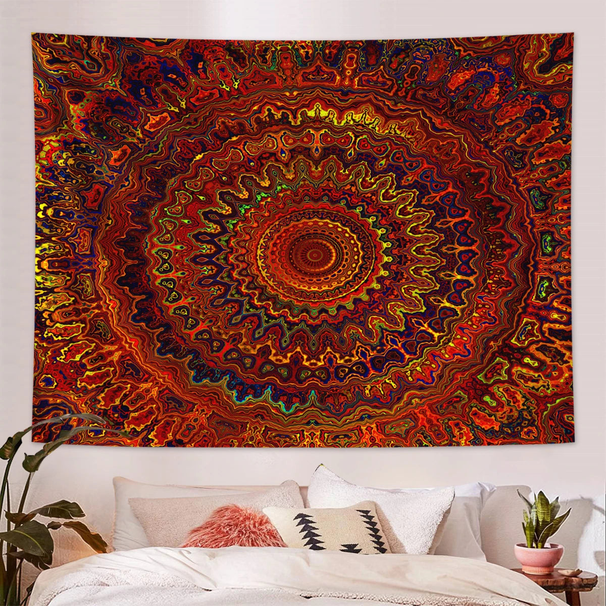 A vibrant, richly colored bohemian mandala tapestry wall hanging with intricate circular patterns.