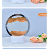 A set of three LED table lamps displaying blue, orange, and black colors with sand-like textures.